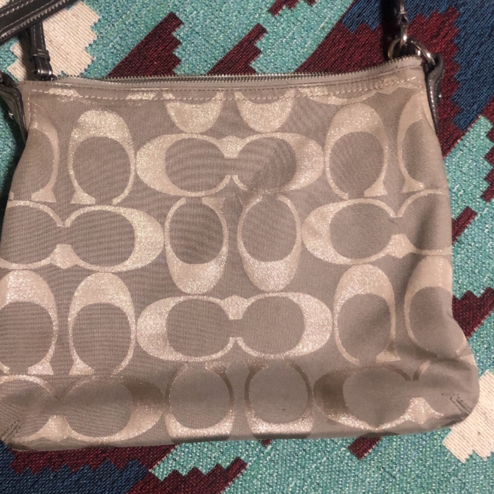 Coach Purse can be cross body or shoulder